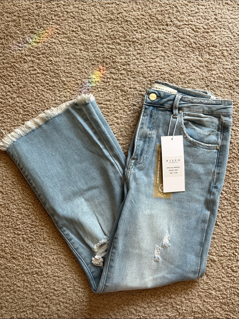 Risen Medium High Rise Light Blue Distressed Women's Bootcut Frayed Jeans